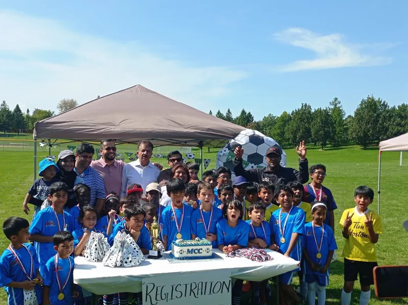 MCC soccer participants celebrating together